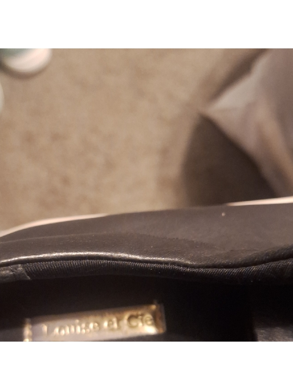 Louise et Cie Sleek Black Leather Bag